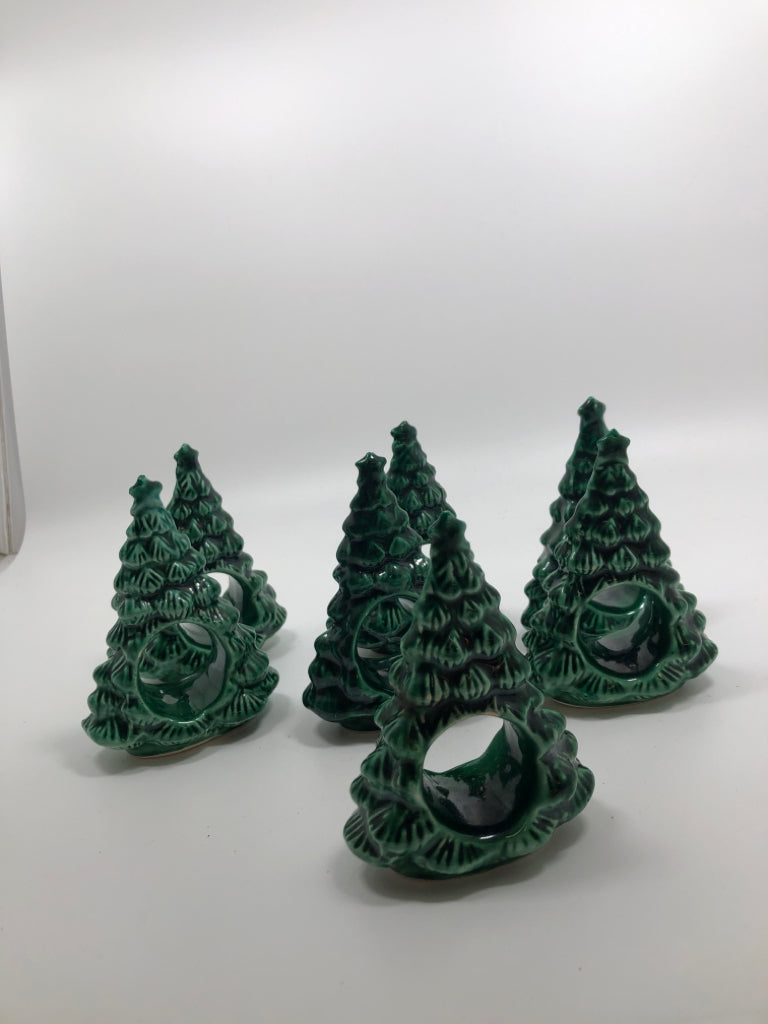 7 CERAMIC CHRISTMAS TREE NAPKIN HOLDERS.