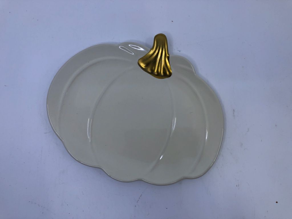 CREAM CERAMIC PUMPKIN DISH W/GOLD PAINTED STEM.