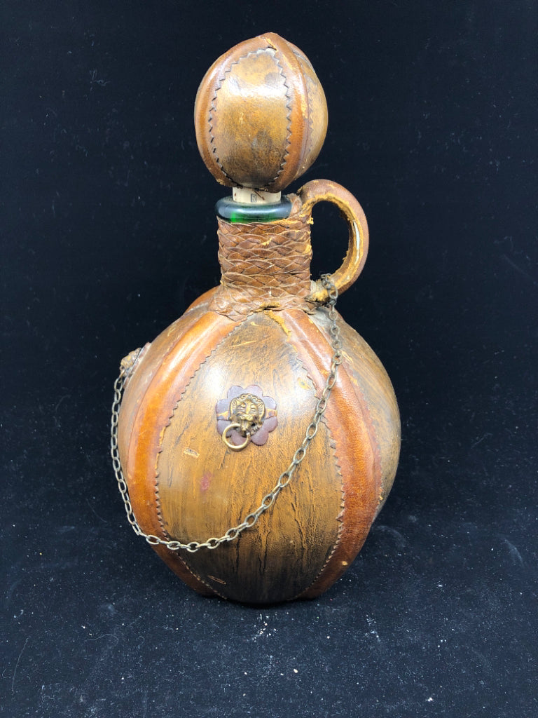 VTG LEATHER WRAPPED EMPTY DECANTER.