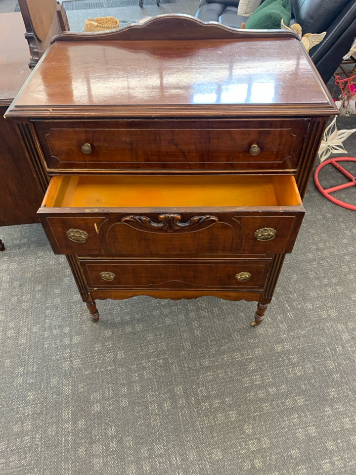 VTG TALL DRESSER W 4 DRAWERS ON WHEELS.