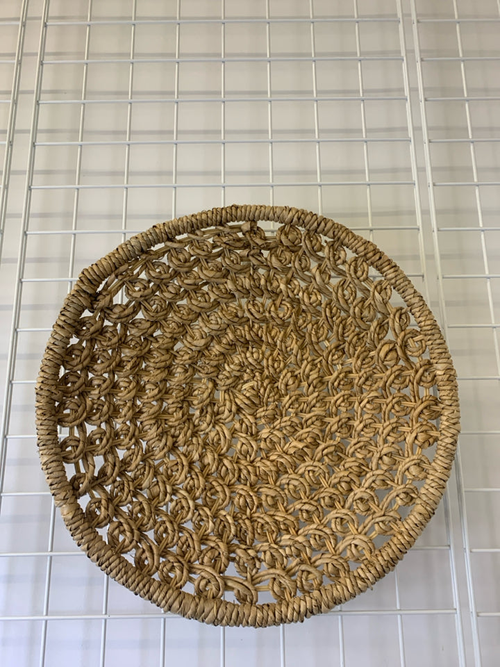 WOVEN CIRCLE BASKET WALL ART.