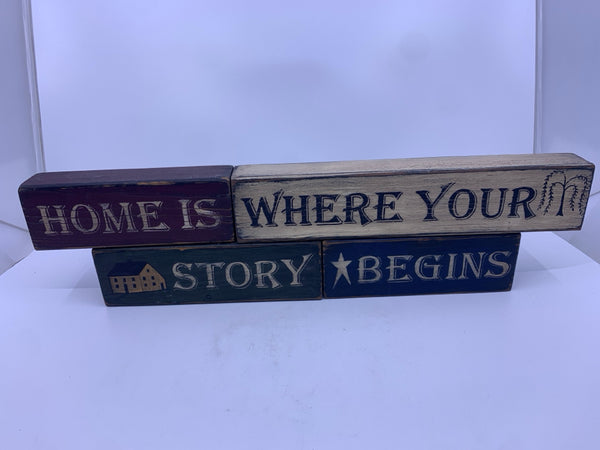 "HOME IS WHERE YOUR STORY BEGINS" PRIMITIVE BLOCKS SIGN.