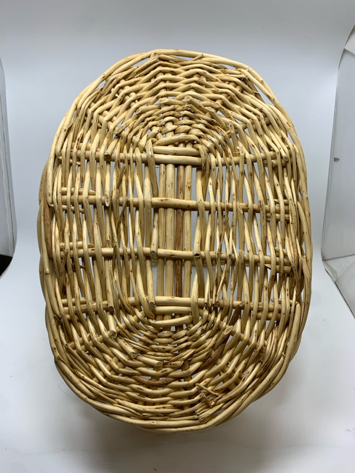 OVAL WICKER BASKET W/LARGE HANDLE.