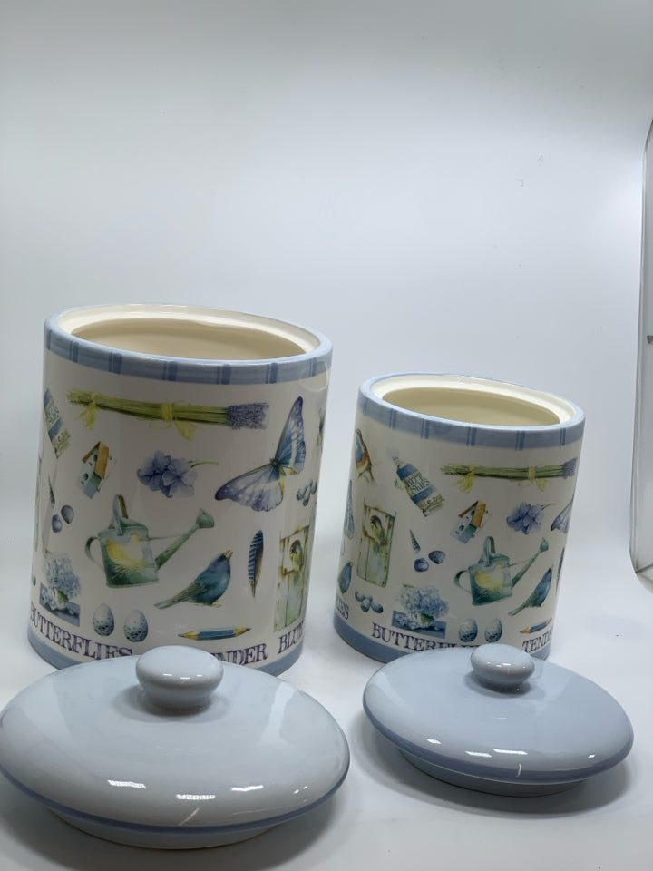 2 BLUE BIRDS AND BUTTERFLIES CANISTERS.