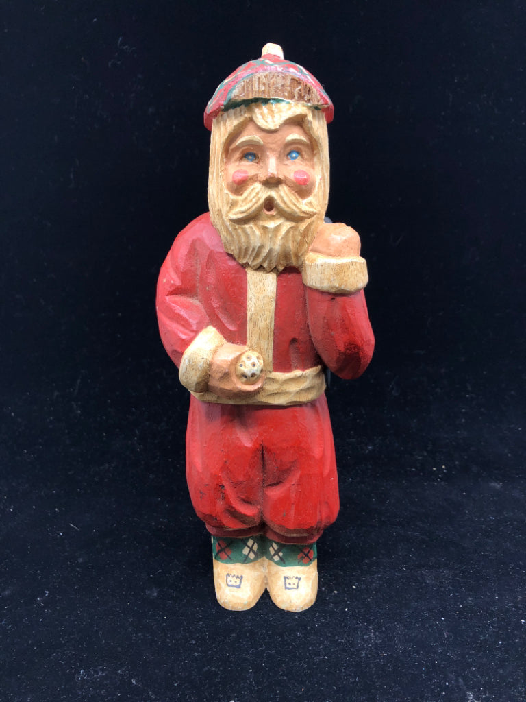 JAMES HADDON WOOD CARVED GOLF SANTA.