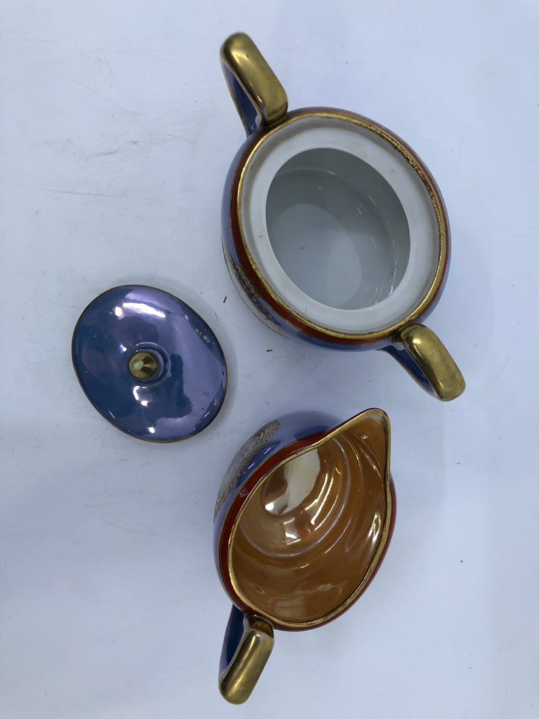 VTG BLUE AND ORANGE FLORAL W GOLD ACCENTS CREAMER AND SUGAR.