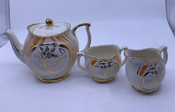 3 PC VTG GOLD FLORAL PATTERN TEA POT, SUGAR+ CREAMER.