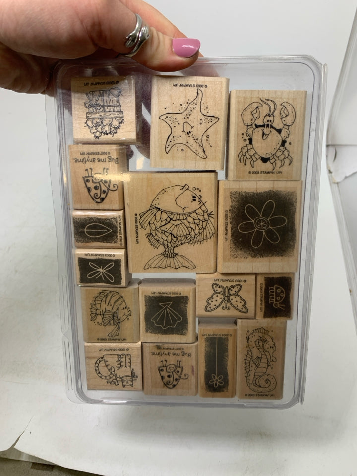 STAMPS IN CASE.