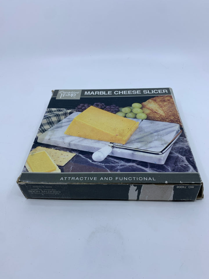 NIB MARBLE CHEESE SLICER.