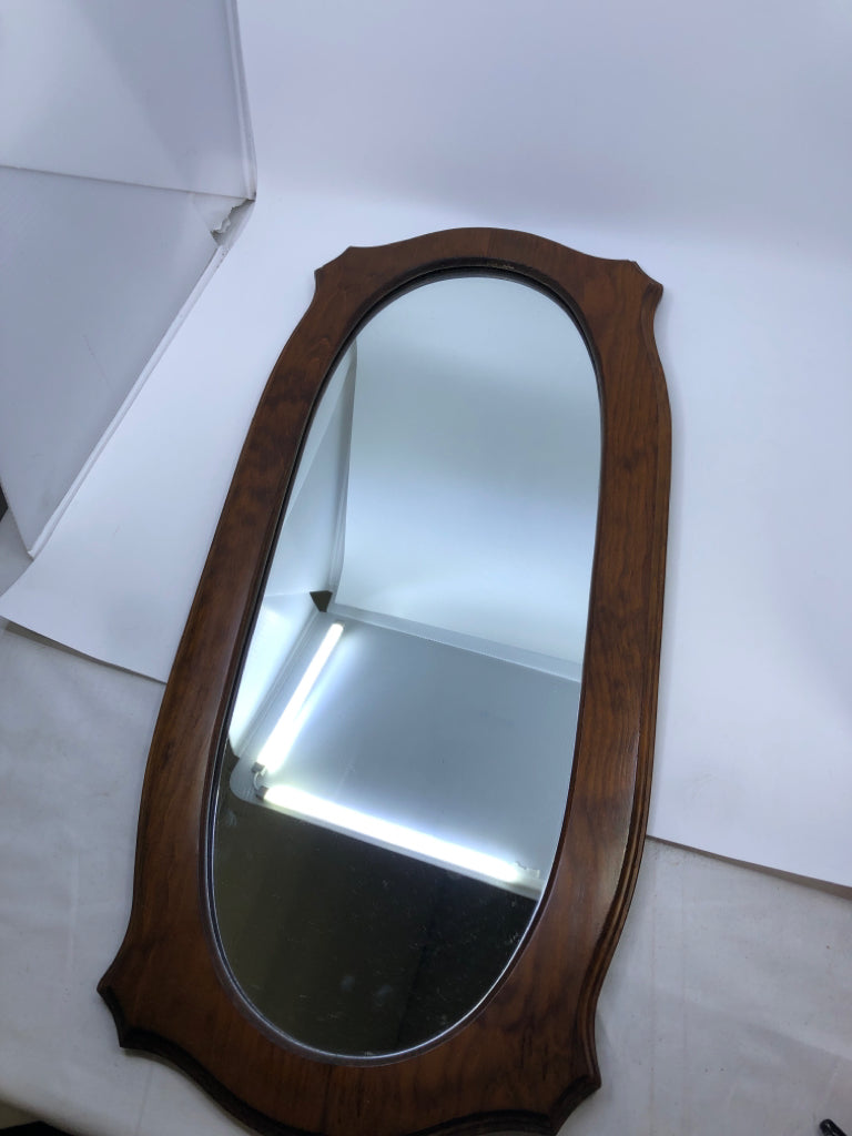 DARK WOOD OVAL MIRROR.