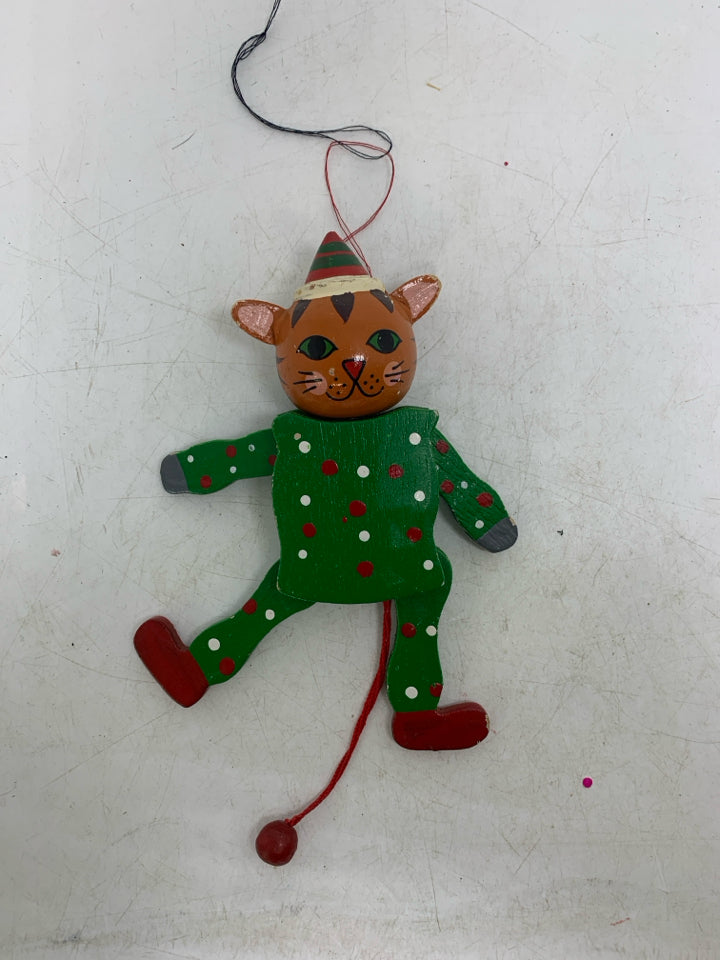 VTG CAT W/ GREEN POLKA DOT SUIT PULL TOY.