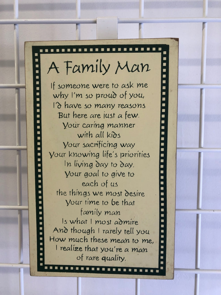 A FAMILY MAN GREEN AND YELLOW WALL ART.