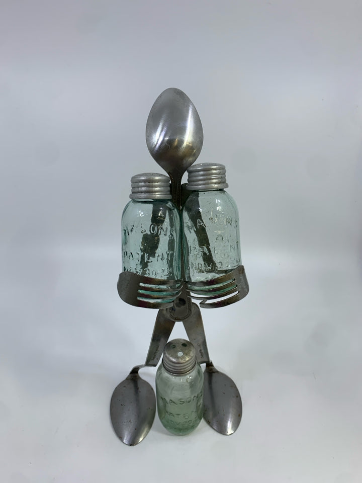 METAL SPOON FIGURE HOLDING SALT/PEPPER AND TOOTHPICK HOLDER.