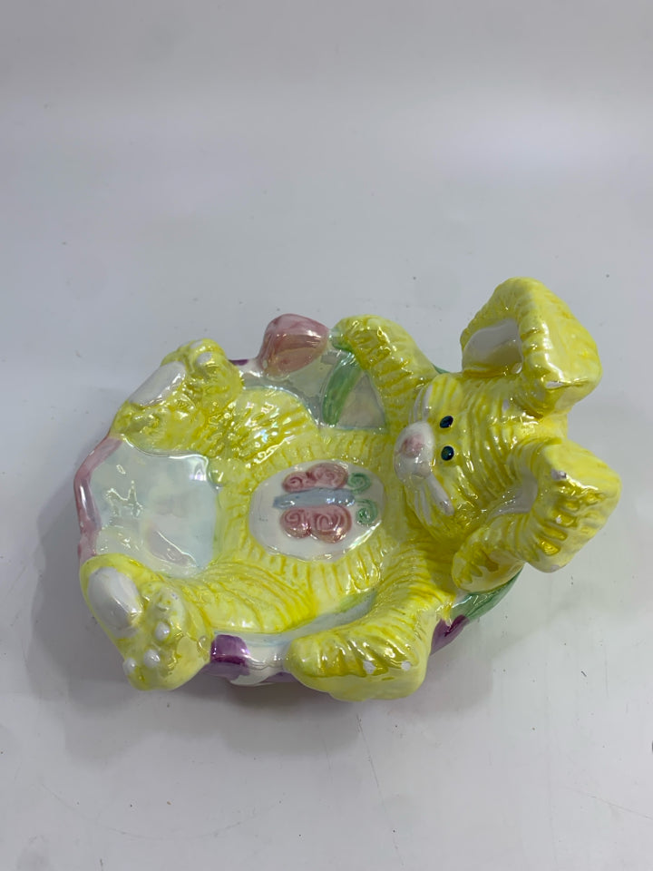 IRIDESCENT BUNNY RELAXING IN EGG.