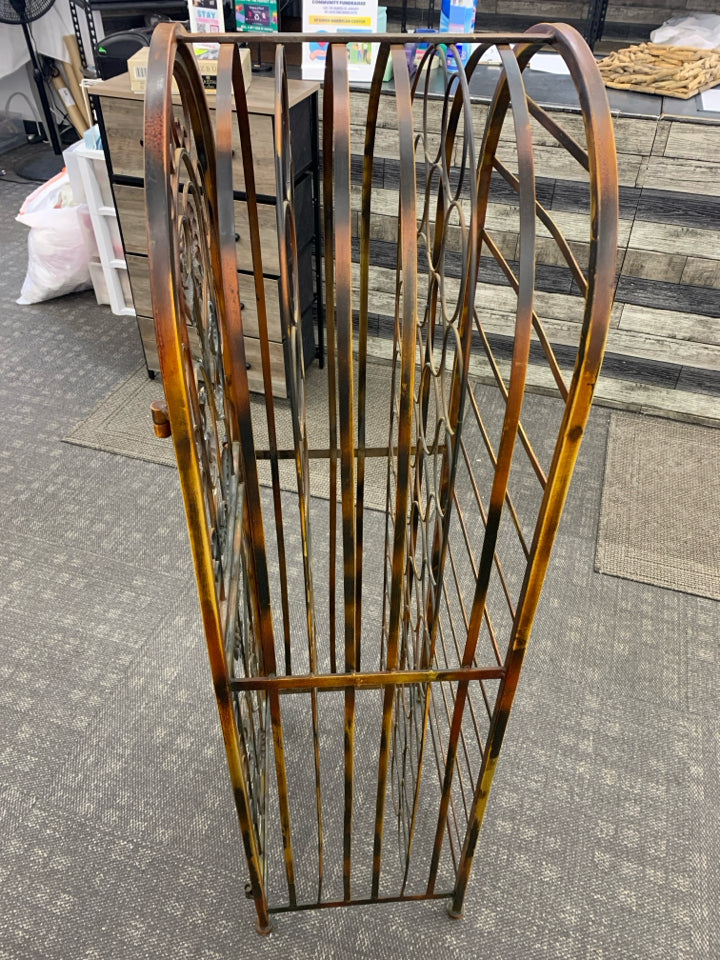 RUSTIC METAL FLOOR WINE RACK.