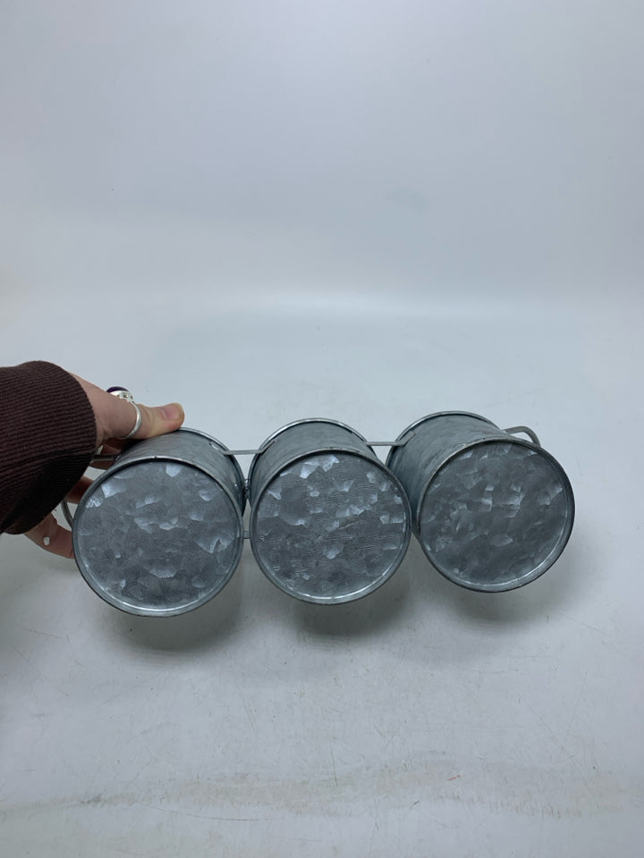 3 SMALL FUSED GALVANIZED PLANTERS.