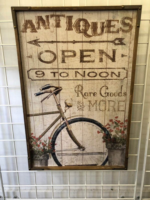 DISTRESSED "ANTIQUES OPEN" SIGN IN WOODEN FRAME.