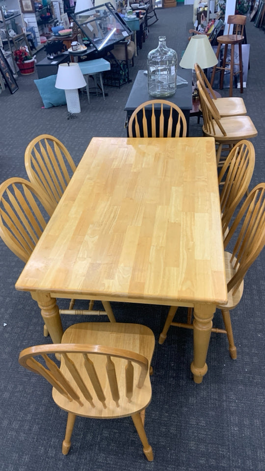 SOLID WOOD TABLE W/6 CHAIRS.