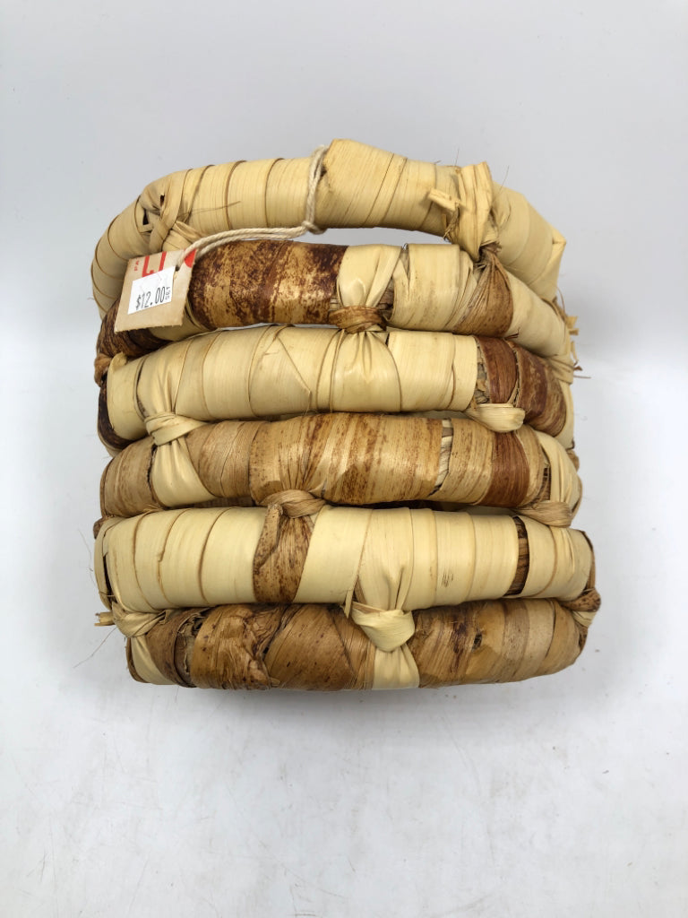 NWT ROUND WOVEN BASKET MADE IN HAITI.