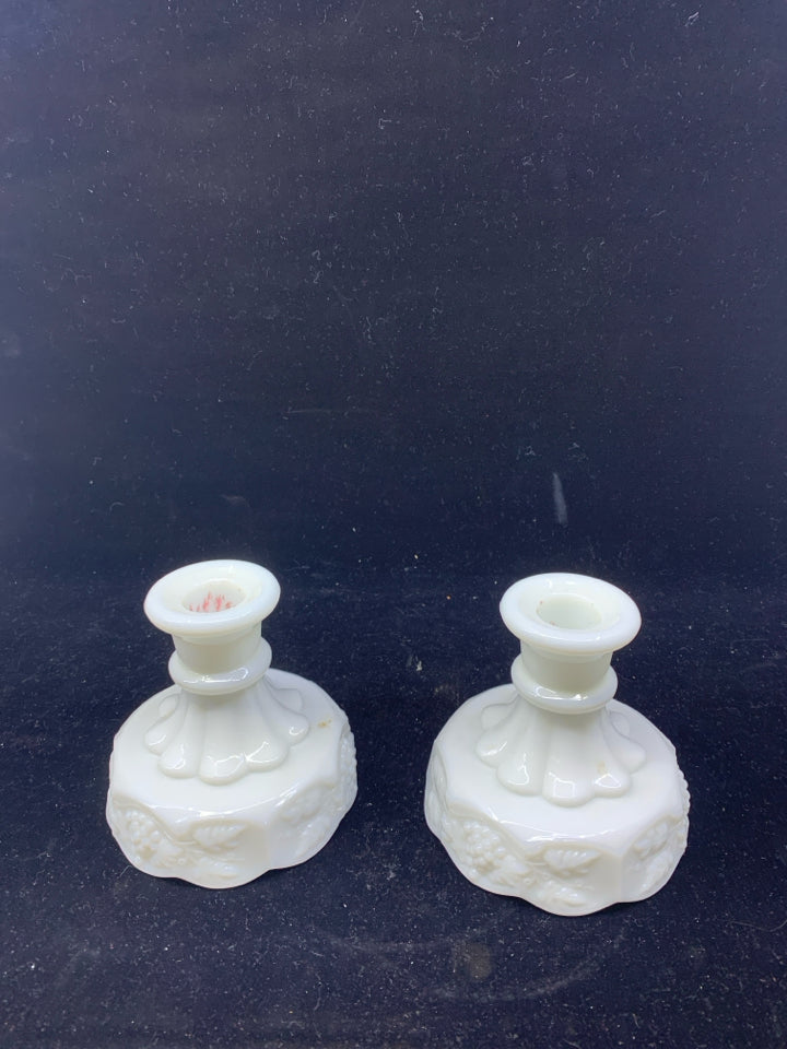 2 VTG MILK GLASS EMBOSSED CANDLE HOLDERS.