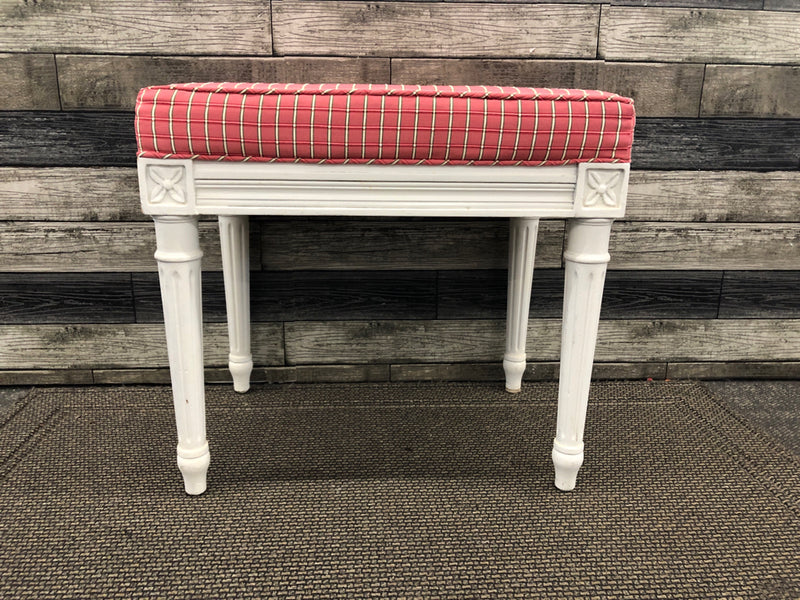 WHITE WOOD FOOTED STOOL W PINK AND GREEN CUSHION.