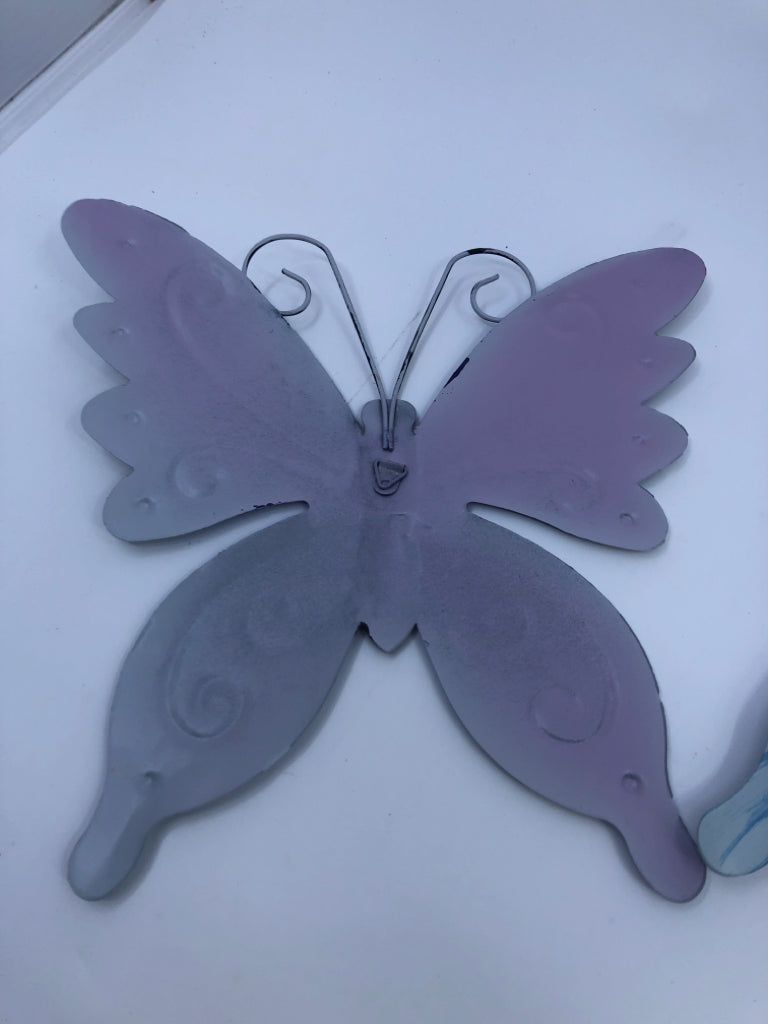 2 BLUE METAL HANGING BUTTERFLIES.
