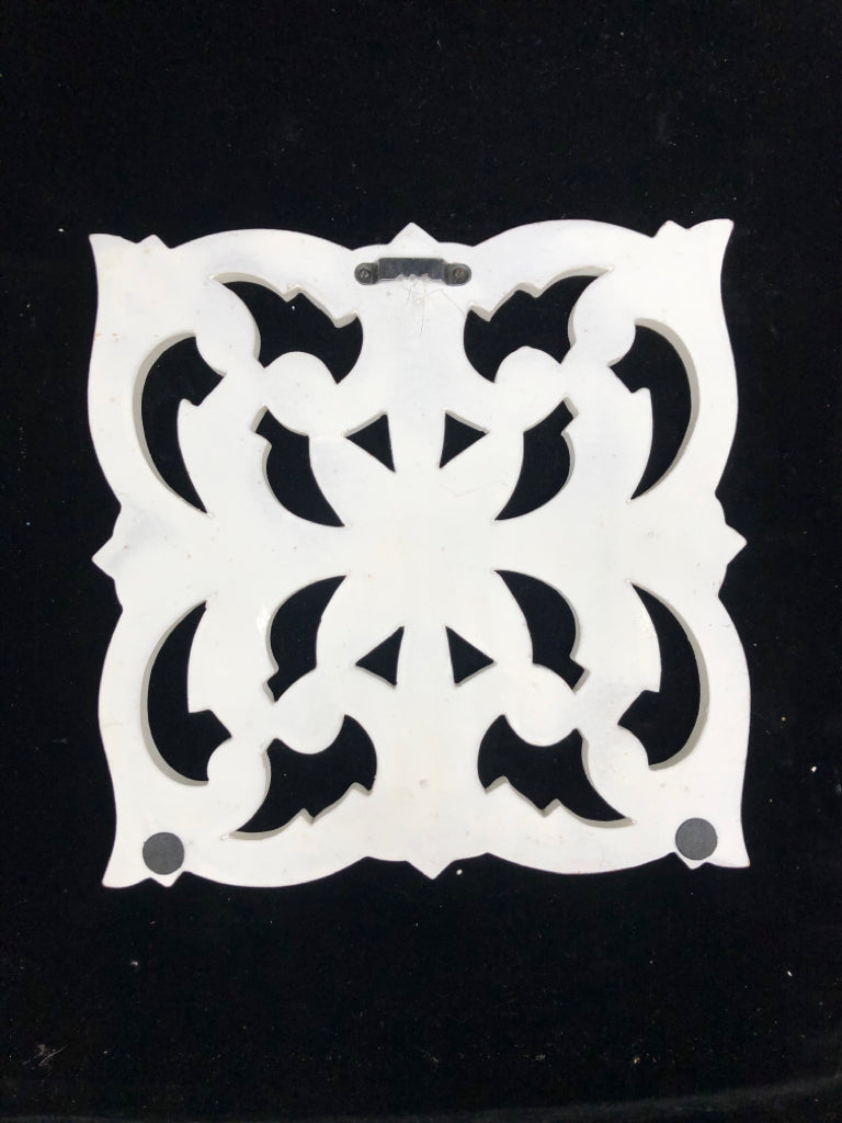 WHITE HAND-CARVED FLORAL WOOD PANEL.