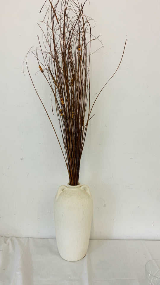 TEXTURED STONE LIKE JUG VASE WITH FAUX STICKS.