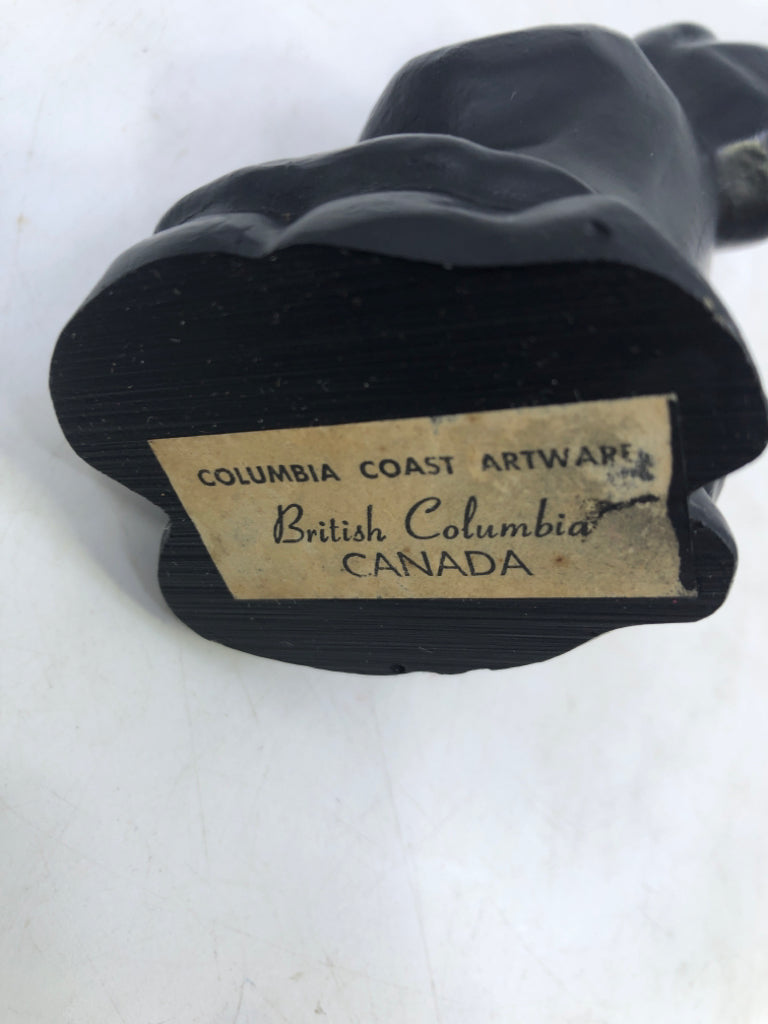 GIRL IN SNOW-COAT HUGGING ANIMAL HAND CARVING COLUMBIA COAST ARTWARE.