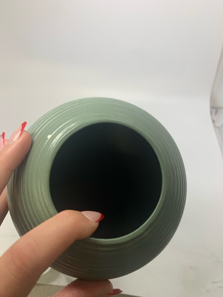 LARGE RIBBED FUNKY SHAPED VASE.