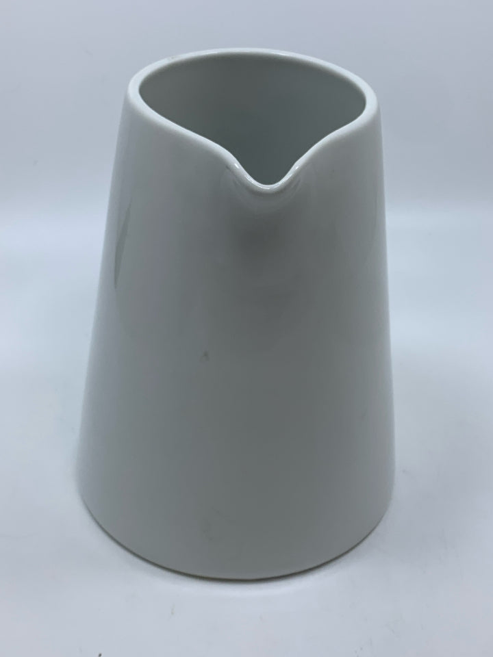 WHITE CERAMIC PITCHER.