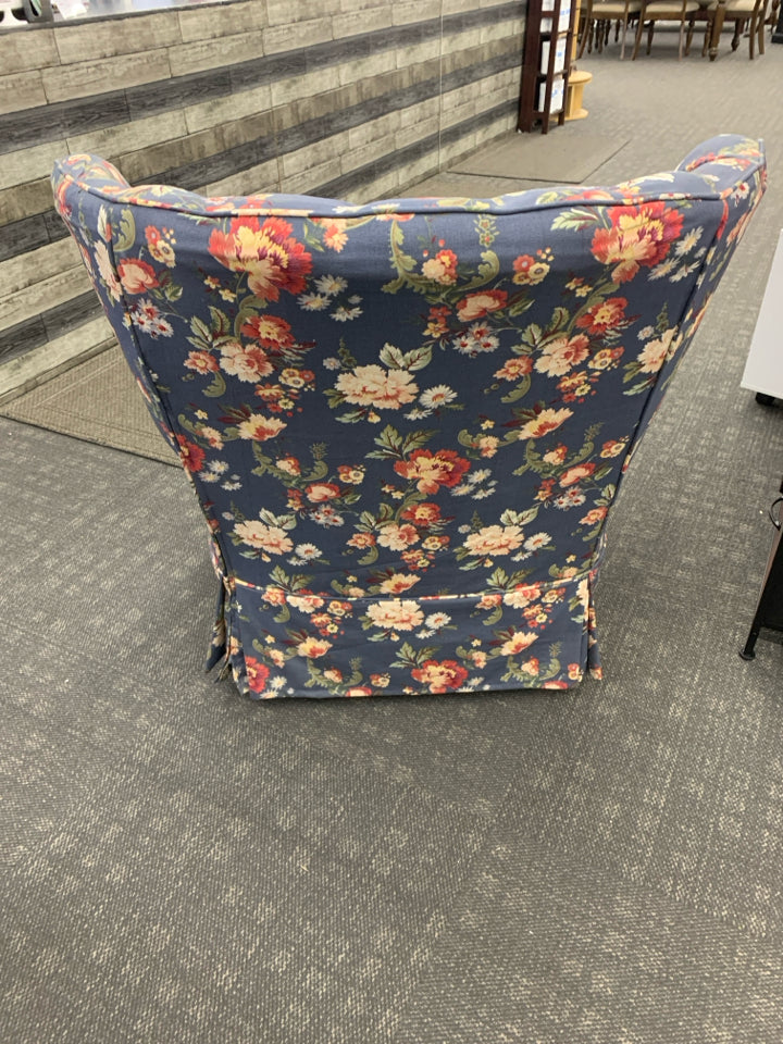 BLUE FLORAL ACCENT CHAIR W ARM SLIPS.