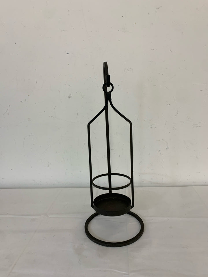 BLACK METAL JAR CANDLE HOLDER.