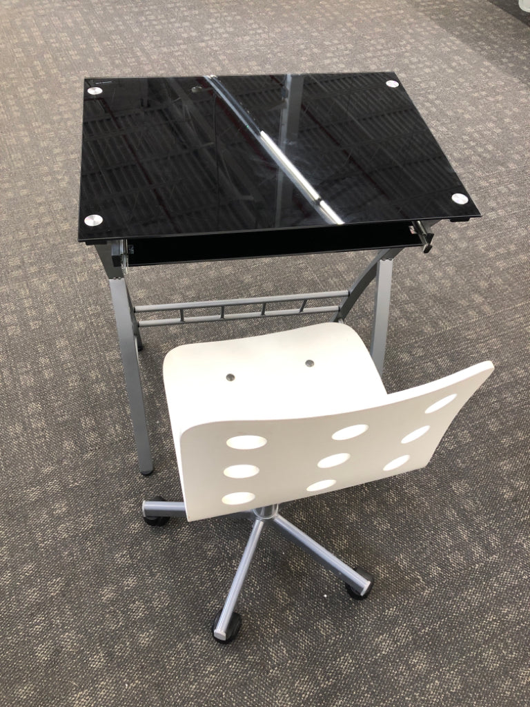 GLASS STUDENT DESK W/WHITE ROLLING CHAIR AND LAP SHELF.