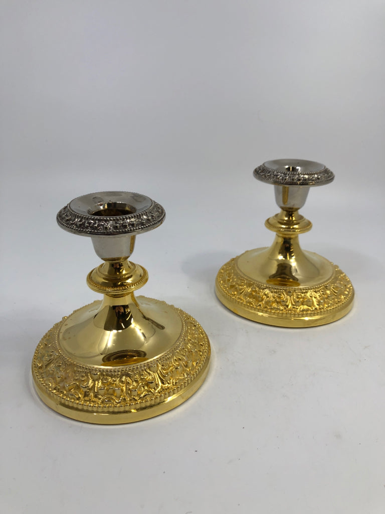 2PC GOLD & SILVER CANDLE HOLDERS.