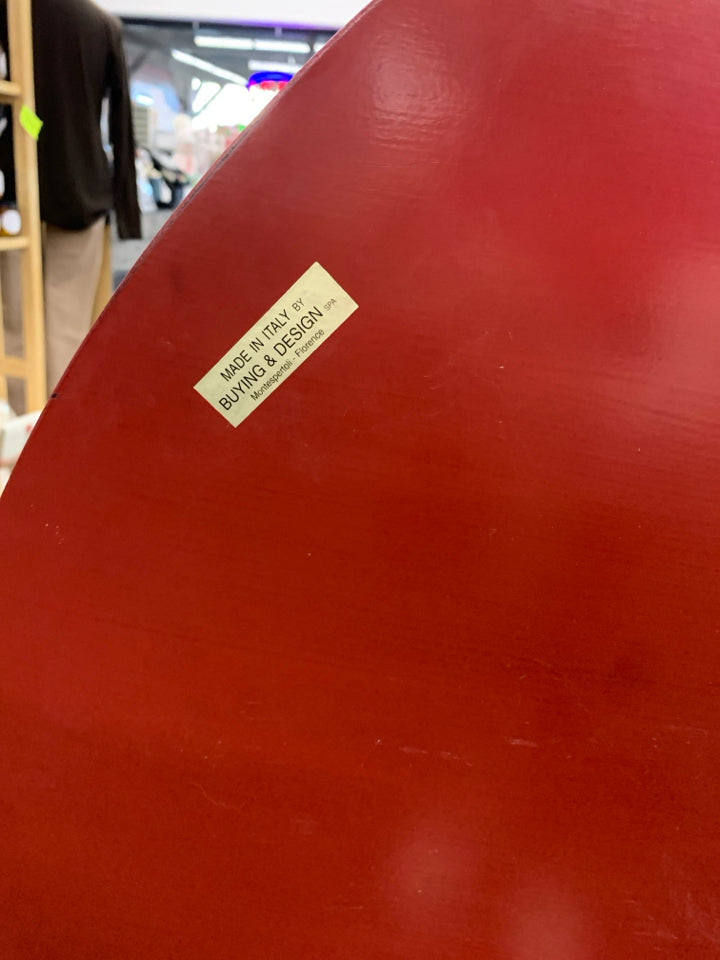 OVAL RED FLIP TOP TABLE.