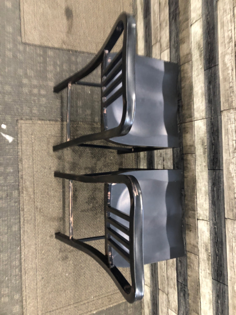 2 BLACK METAL DISTRESSED LOW BACK STOOLS.