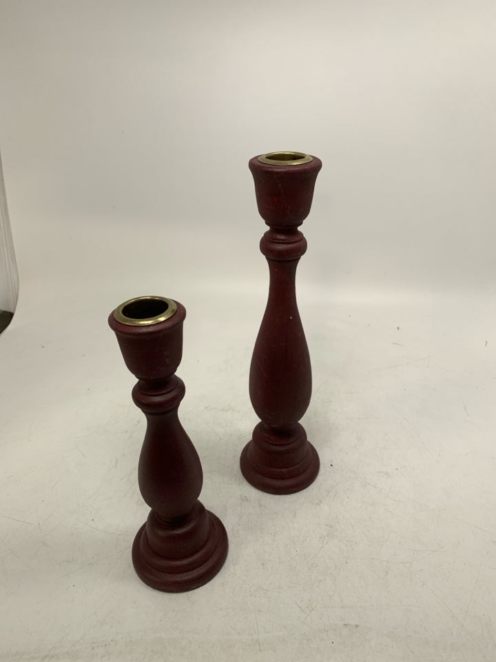 2 WOOD TAPERED CANDLE HOLDERS.