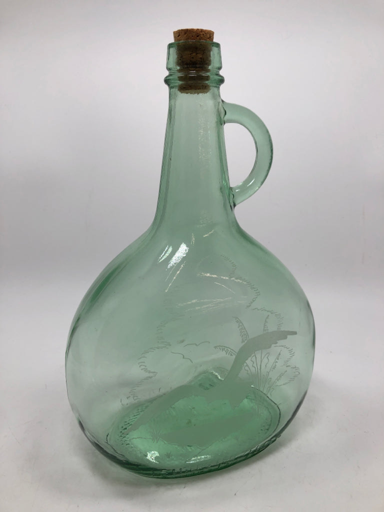 GREEN GLASS JUG W/ETCHED BIRD & FINGER LOOP HANDLE.