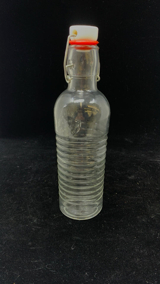 CLEAR RIBBED GLASS BOTTLE W/STOPPER.