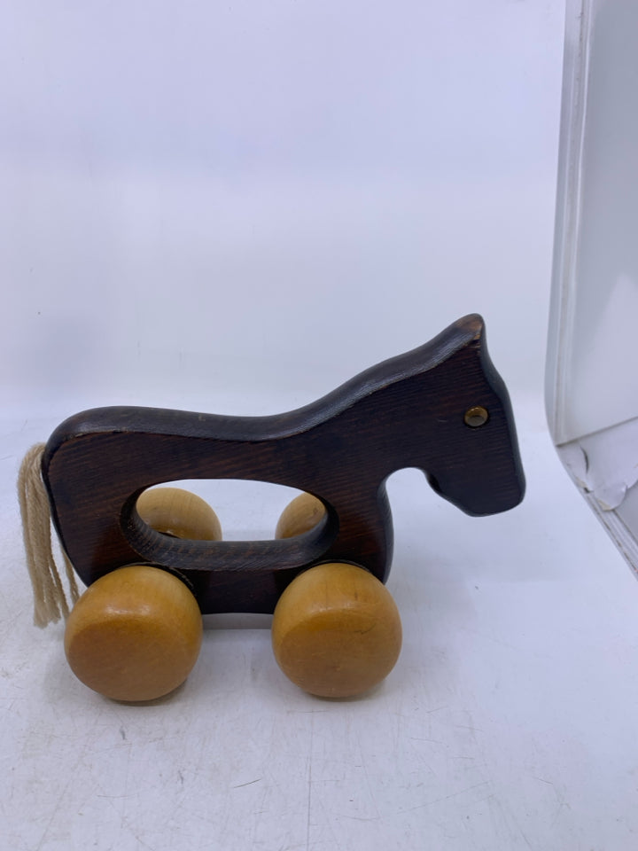 ROLLING 2 TONED WOOD HORSE.