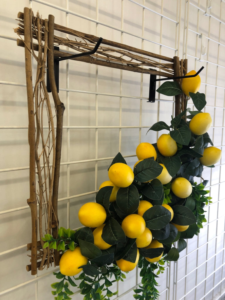 TWIG FRAME WITH PLASTIC LEMON & LEAF DECOR.