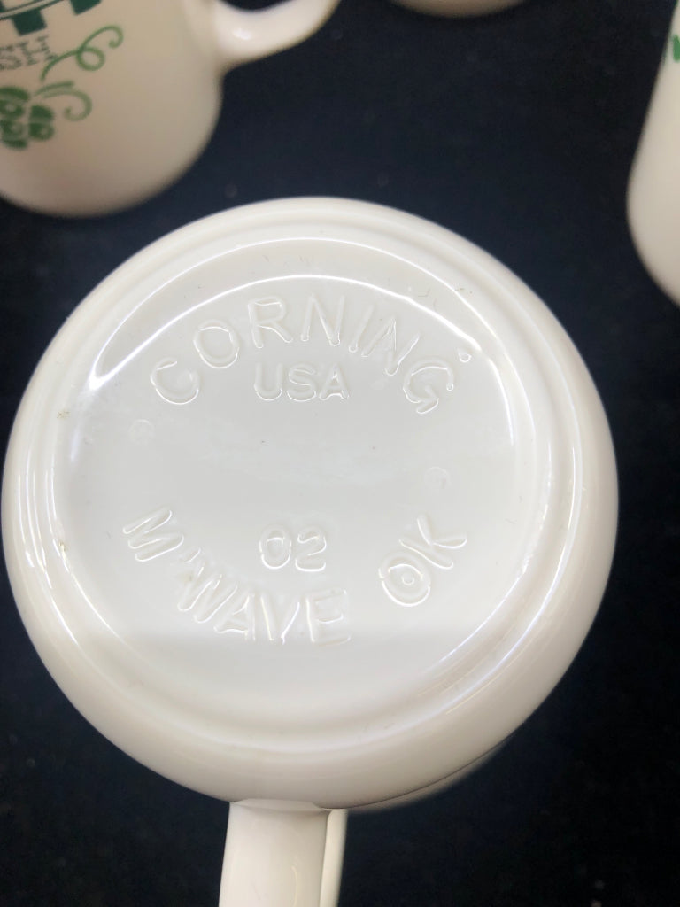 4 APPLE PATTERN CORELLE MUGS.