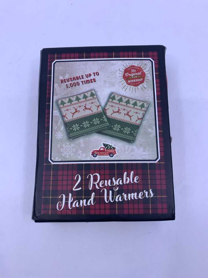 NIB REUSABLE HAND WARMERS.