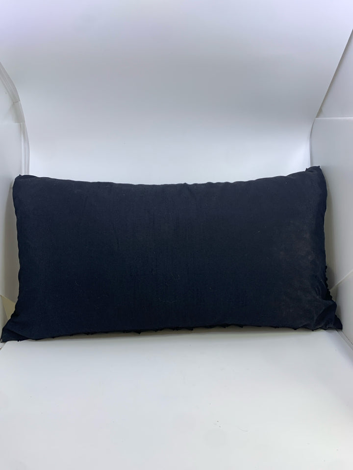 BLACK RUFFLED RECTANGLE PILLOW.