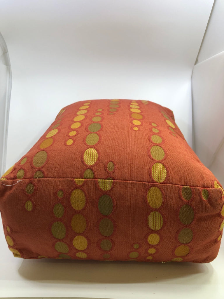 ORANGE RECTANGLE ACCENT PILLOW W/GREEN & YELLOW CIRCLES.