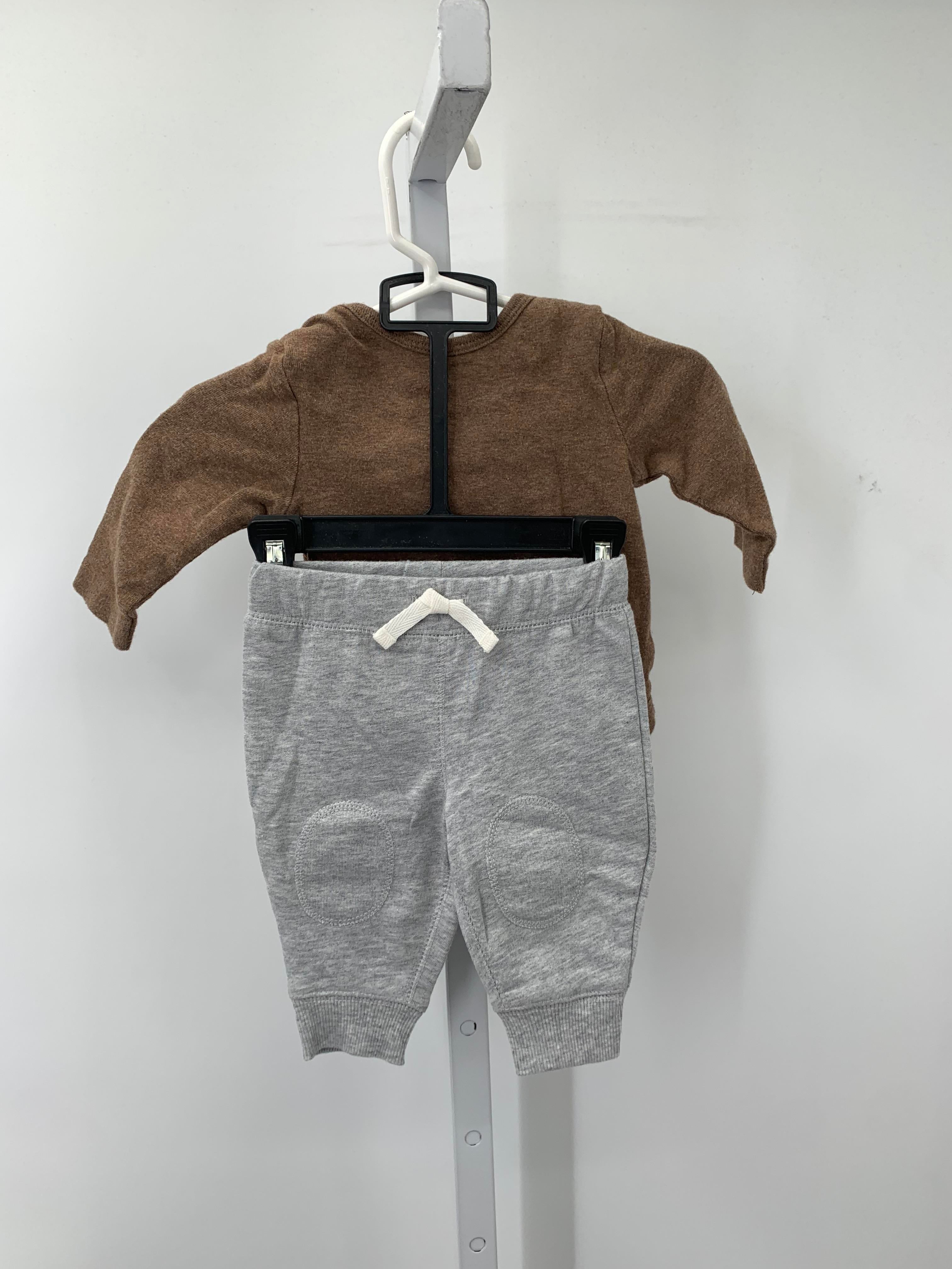 FOOTBALL SHIRT AND GREY PANTS