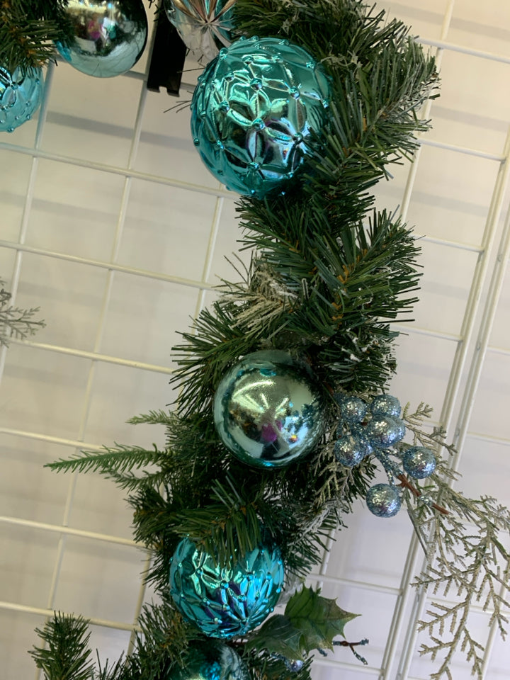 FROSTED GARLAND W BLUE AND SILVER BULBS.