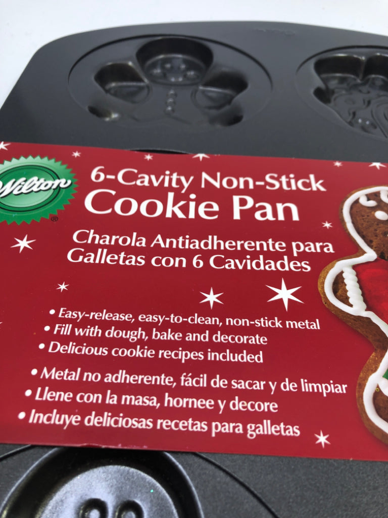 NIP WILTON GINGERBREAD HOUSE/MAN PAN.