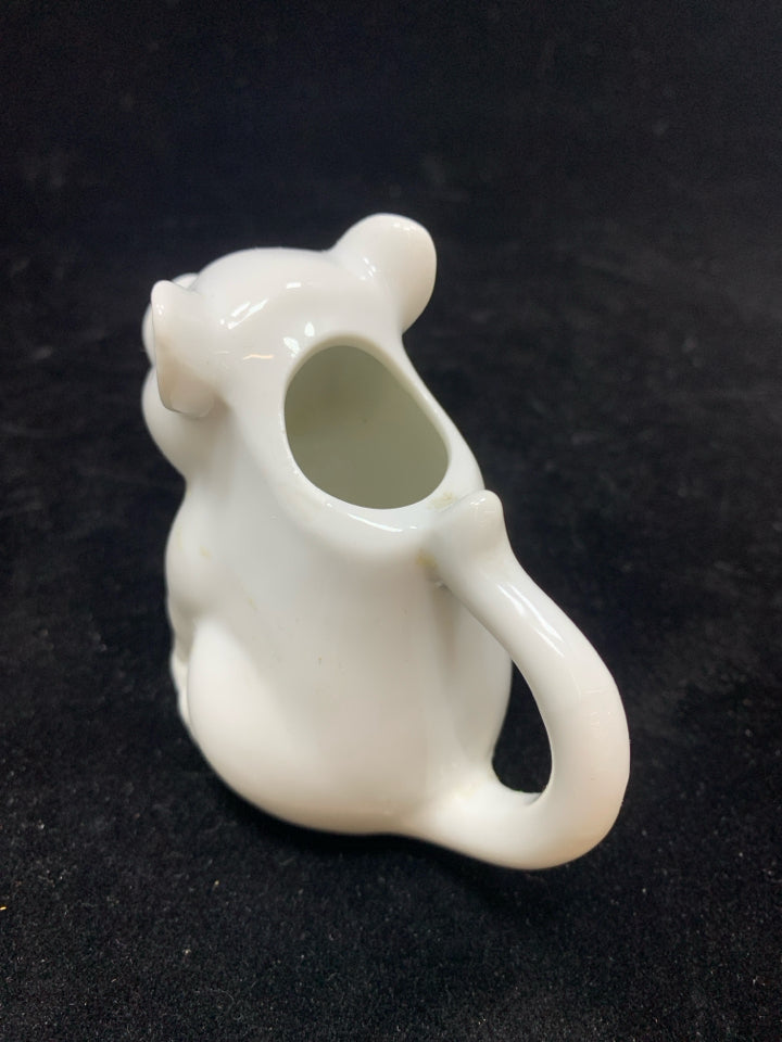 SMALL WHITE PIG CREAMER.